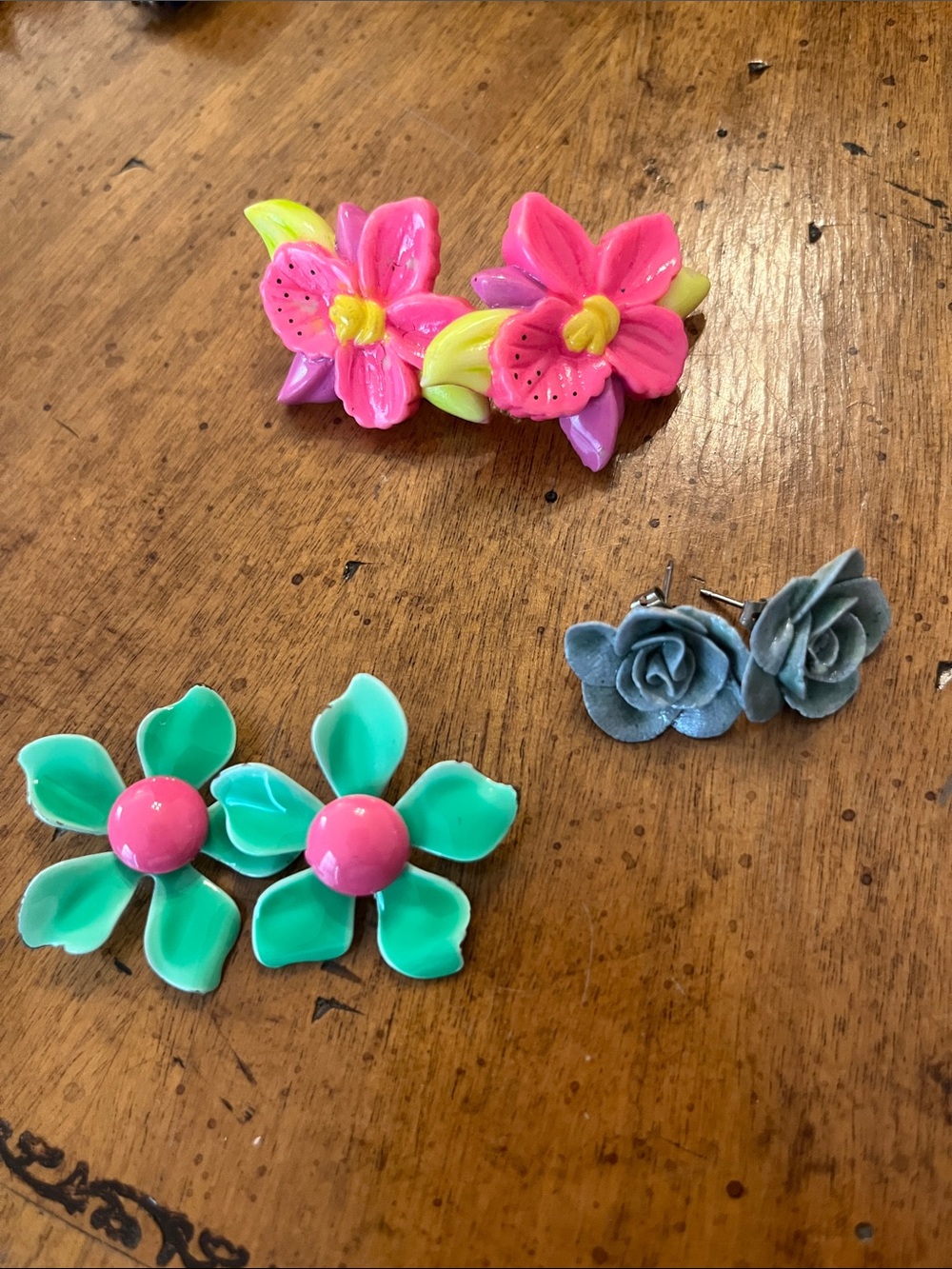 Three sets of floral earrings